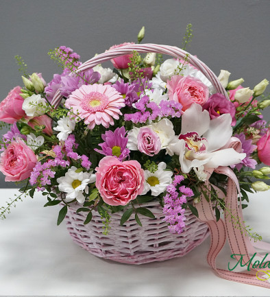 Basket with peony-style roses and orchids photo 394x433